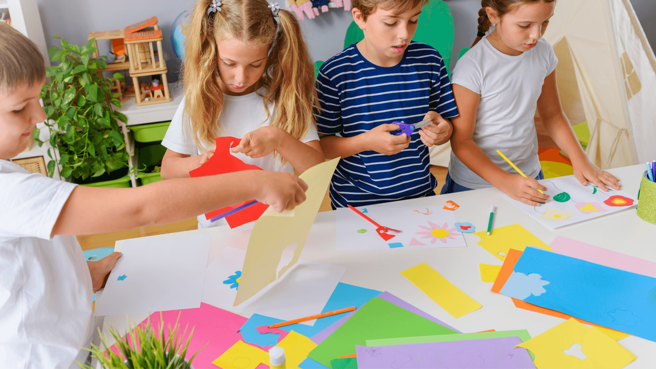 Kids showing Creativity with Colored paper