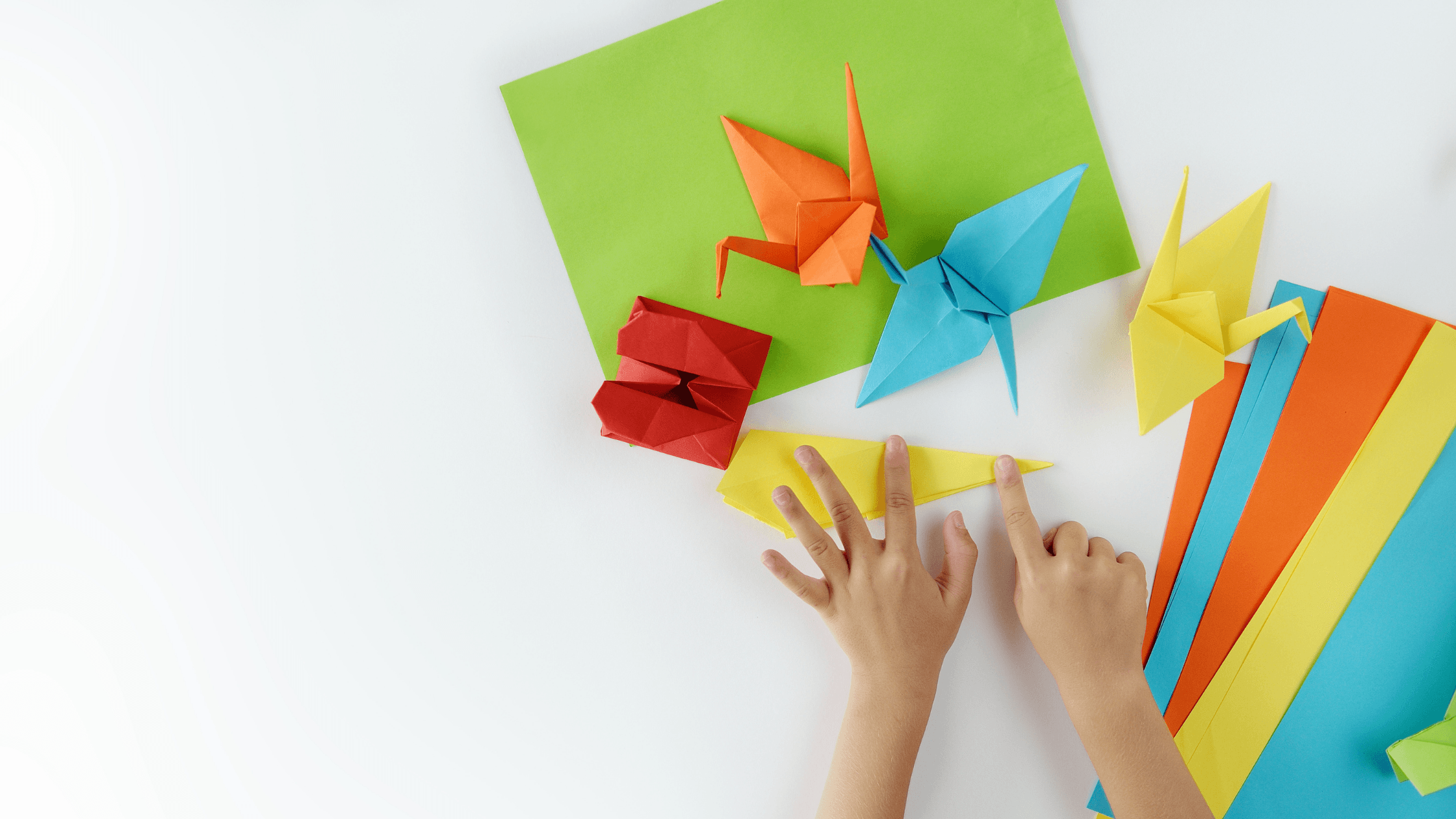 Kid doing Paper craft activities 