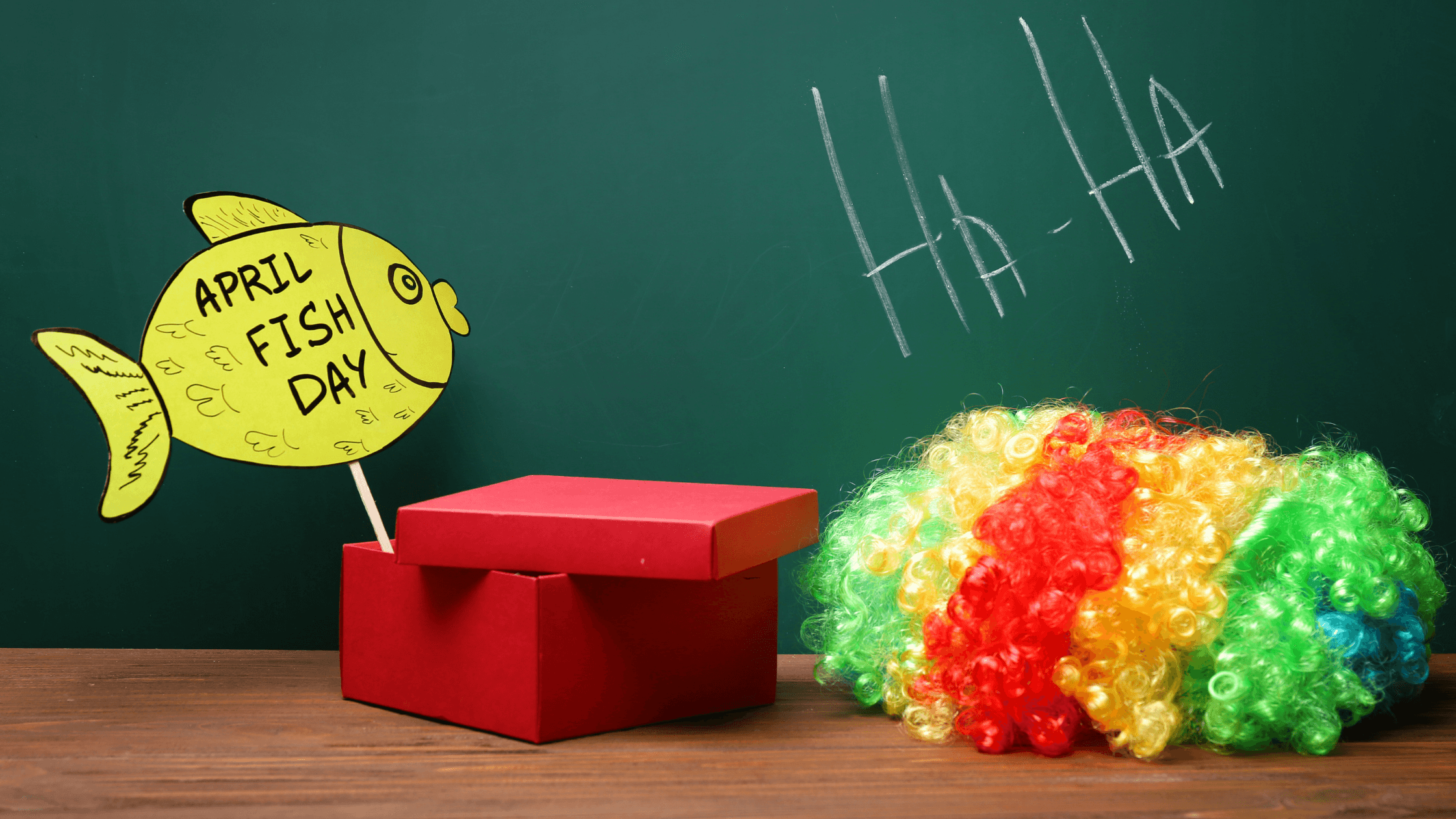 April fish day toys and Ha-Ha written on blackboard 