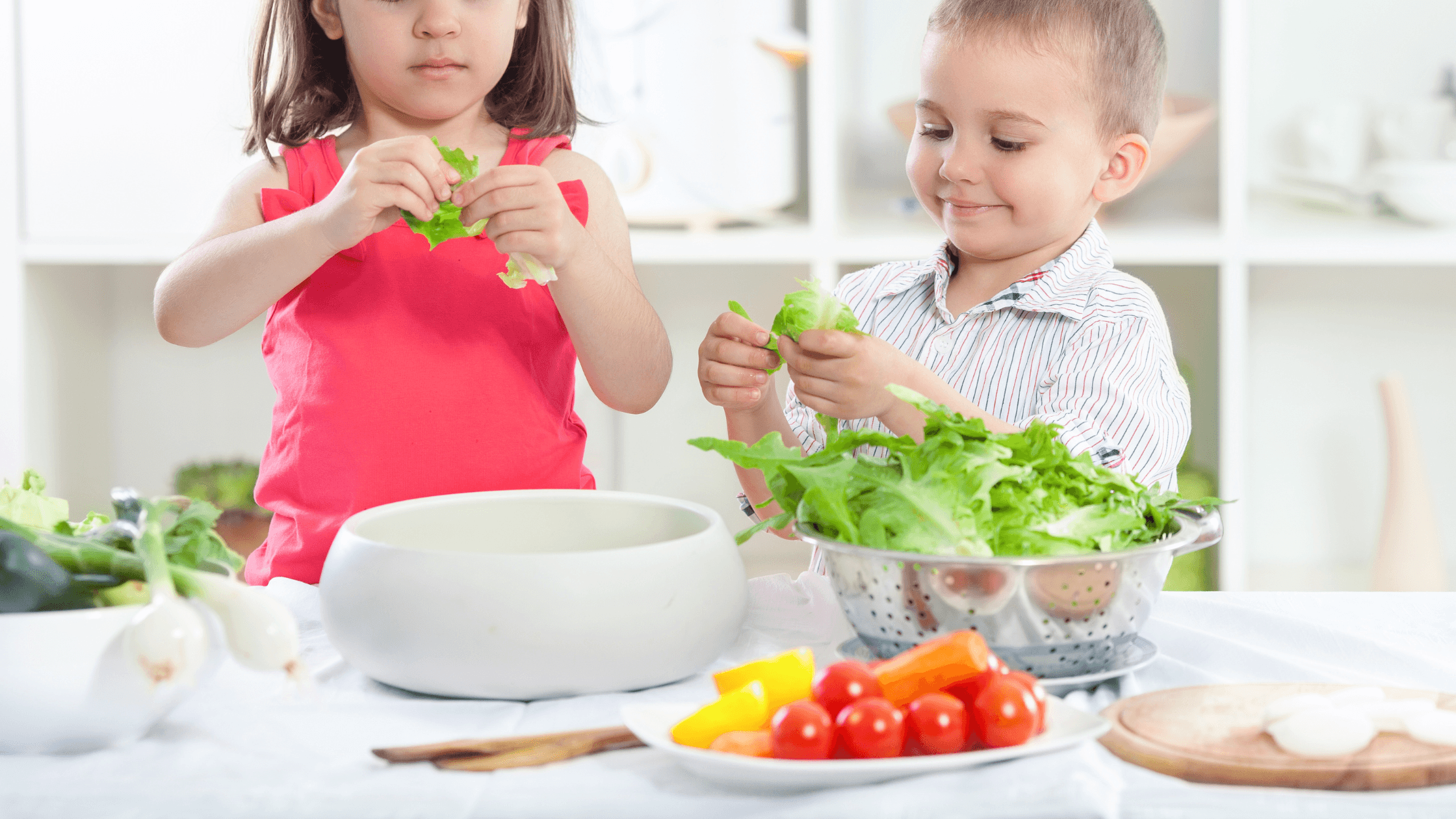 two children with vegetables